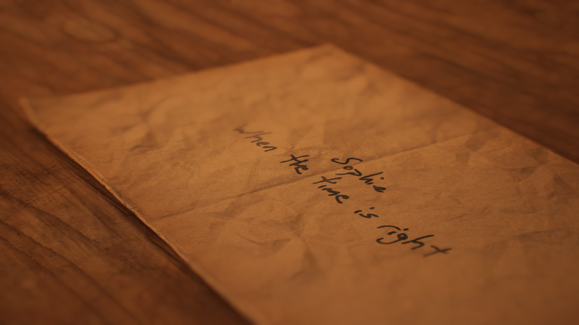 Una busta di carta con la scritta a mano "Sophie, when the time is right", da Lost & Found: A This Bed We Made Story.