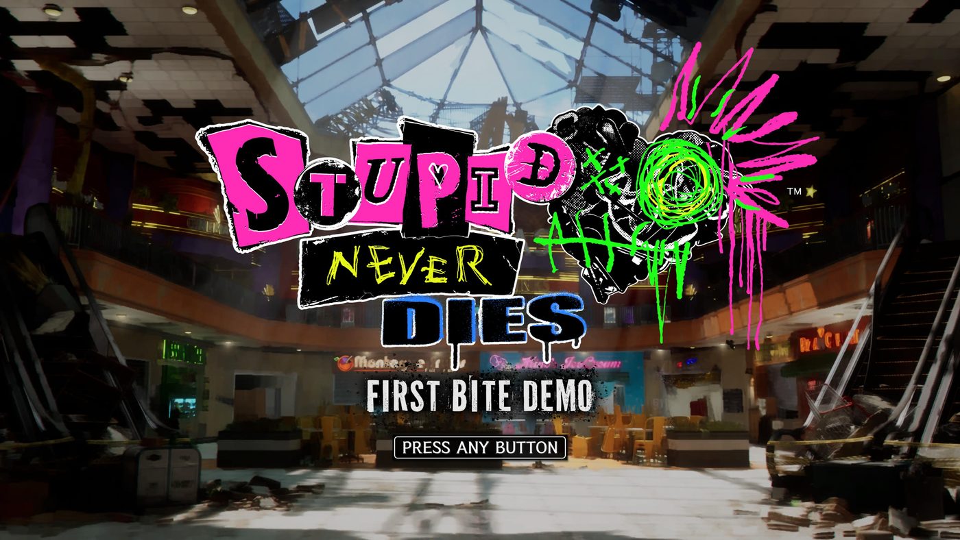 Schermata del titolo di Stupid Never Dies con logo punk e la scritta First Bite Demo su sfondo di centro commerciale distrutto.